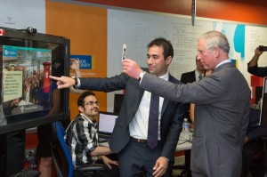 Flybits Founder Hossein Rahnama showing the platform's capabilities to His Royal Highness, the Prince of Whales
